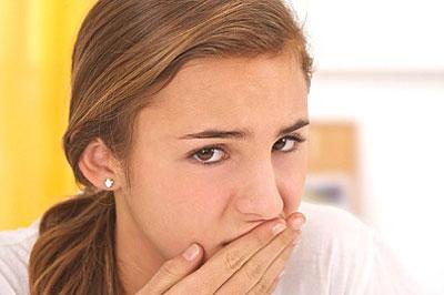 Тошнота у девушки